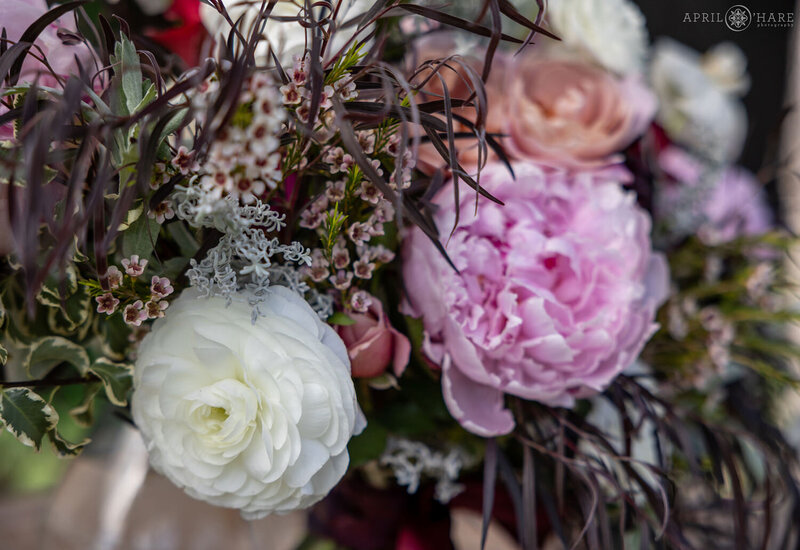 Details for a bohemian floral bridal bouquet created by Sheilan Mueller at Yarrow & Spruce