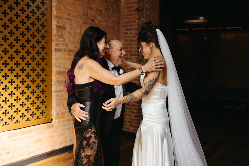 bride and friend dancing at wedding reception