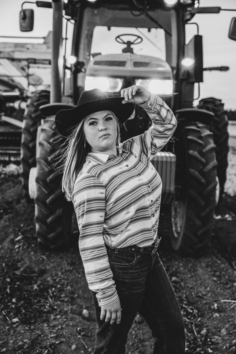 High School senior girl black and white with tractor