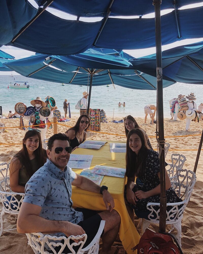 Brad and his family at the beach