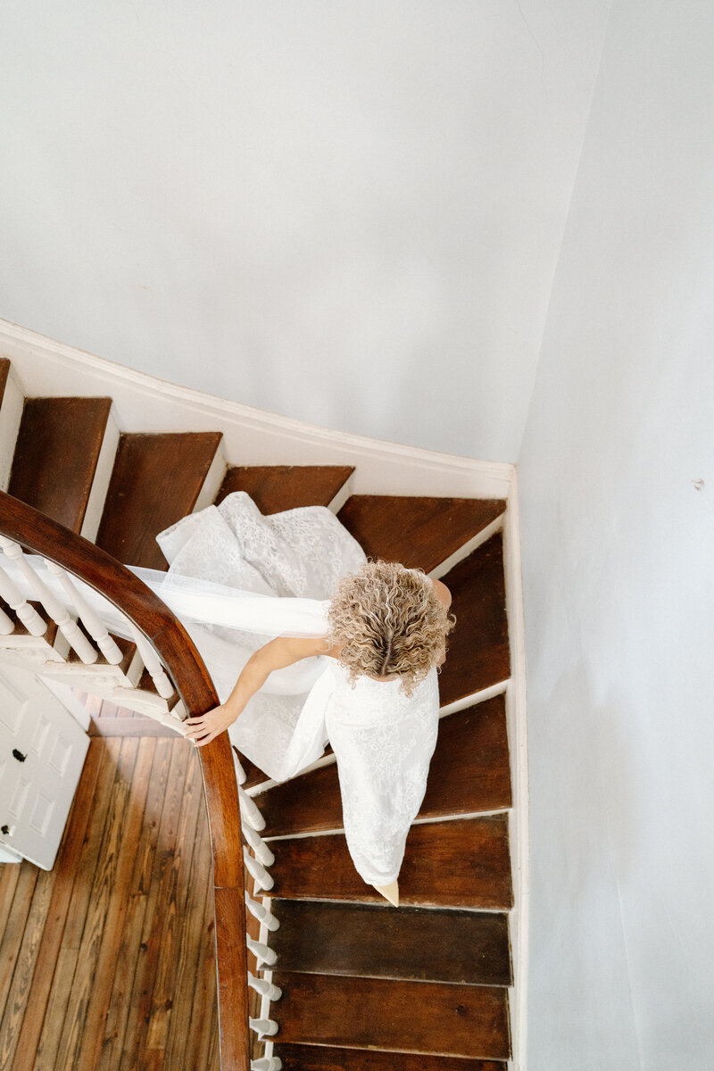 bride walking downstairs