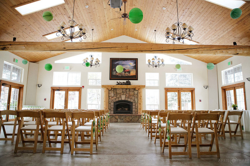 Indoor wedding ceremony inside the Meadow Creek Lodge & Event Center Pavilion in Colorado
