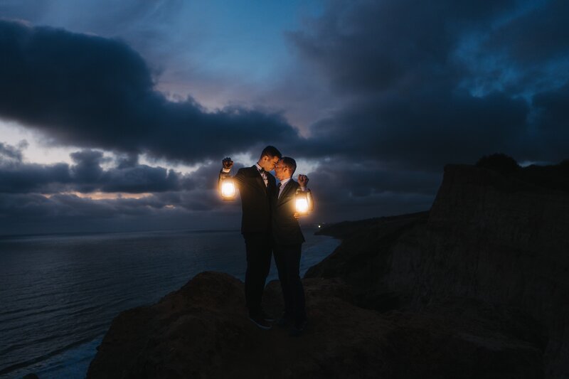 bride and groom cliff and ocean