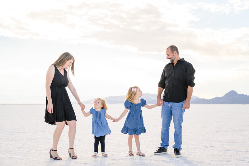 utah family photographer of family posed at the poppy field at lambert park in alpine utah 