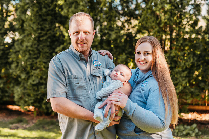 Owners Ryan and Leah Kornelsen holding their infant son