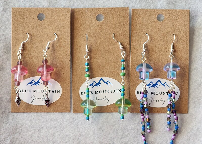 Close up shot of handmade earrings by Ashly 
