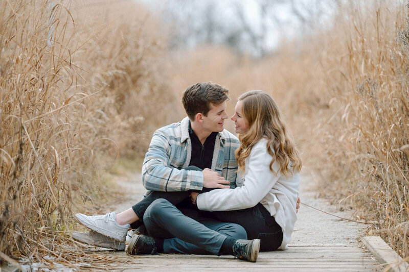 Kelly Jo Photography captures a newly engaged  couple talking