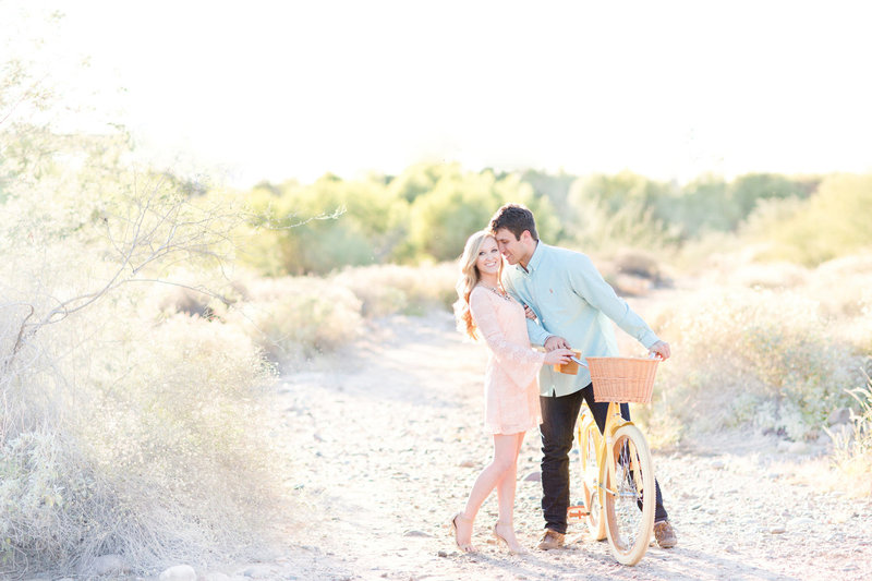 Blush Sunset Desert Bicycle Engagement Session | Amy & Jordan Photography