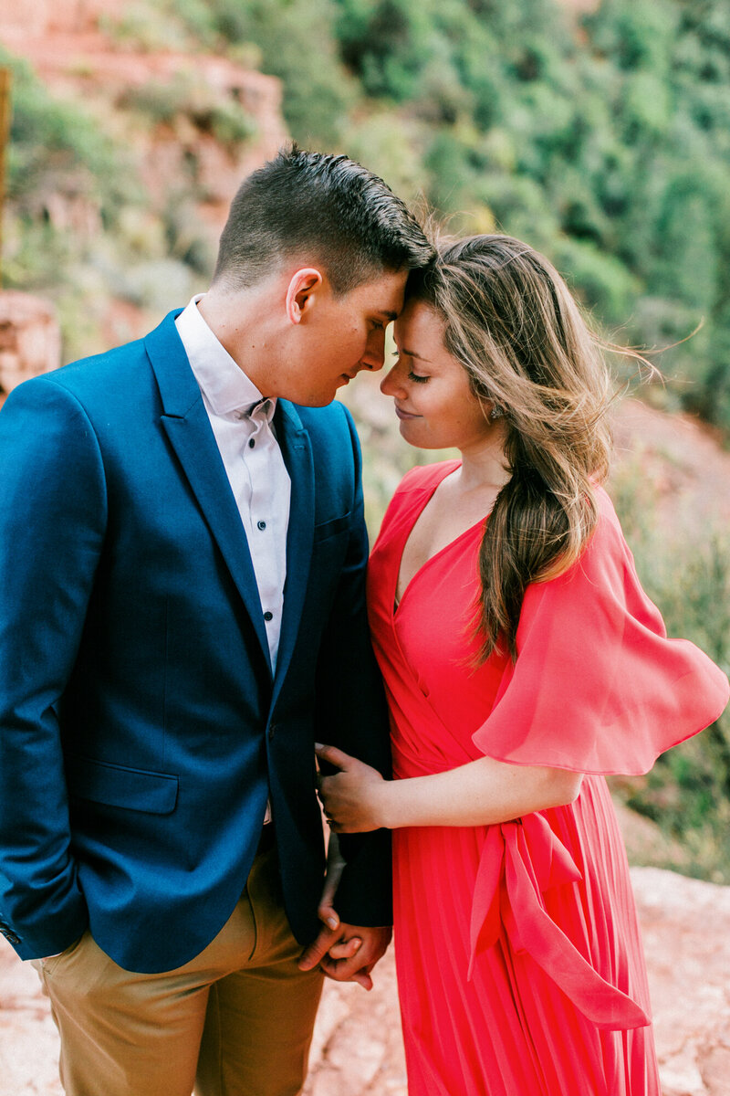 A soft and romantic engagement session taken at Cathedral Rock in Sedona Arizona