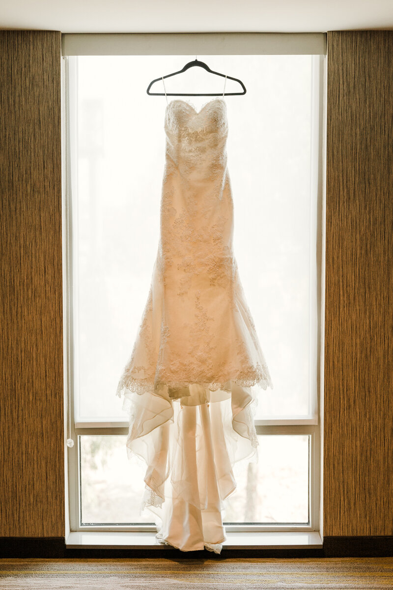 Detail shot of wedding dress in the window