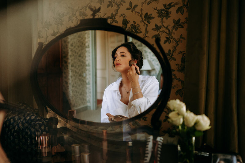 Bride getting ready at the hilden house in vermont  