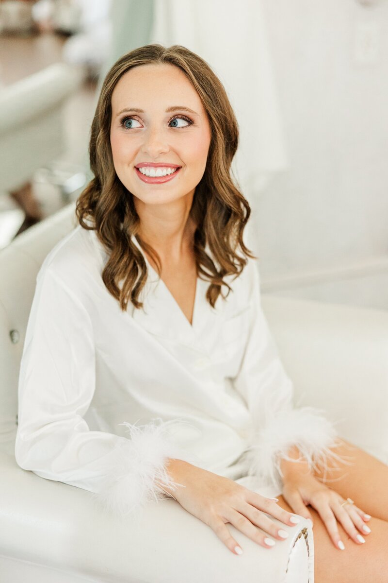 a bride in her morning robe before her wedding