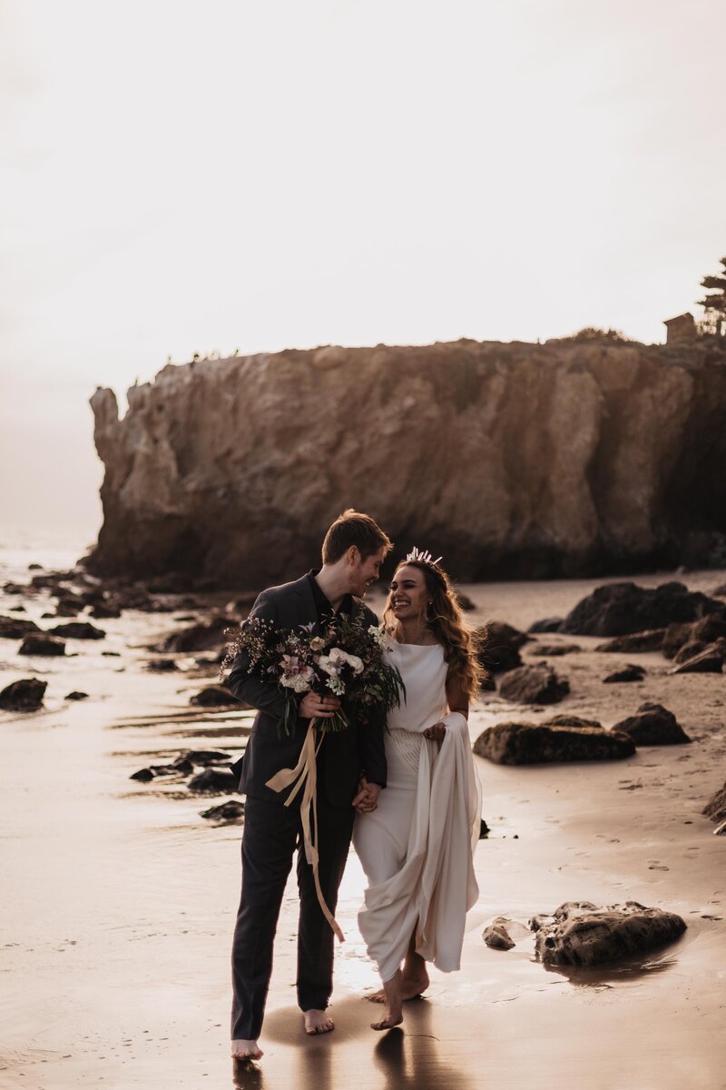 Destination wedding on El Matador State Beach in Malibu, California captured by adventure elopement photographer Magnolia + Ember.