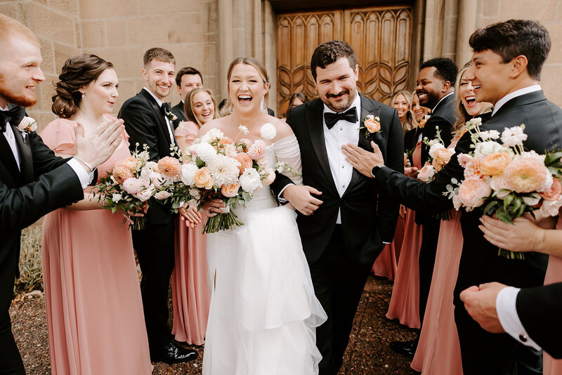 bride and groom under veil