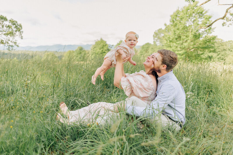 Family photos with mom, dad and baby girl at the Biltmore Estate with Asheville, NC Family and Motherhood Photographer Rachel Marie Photography