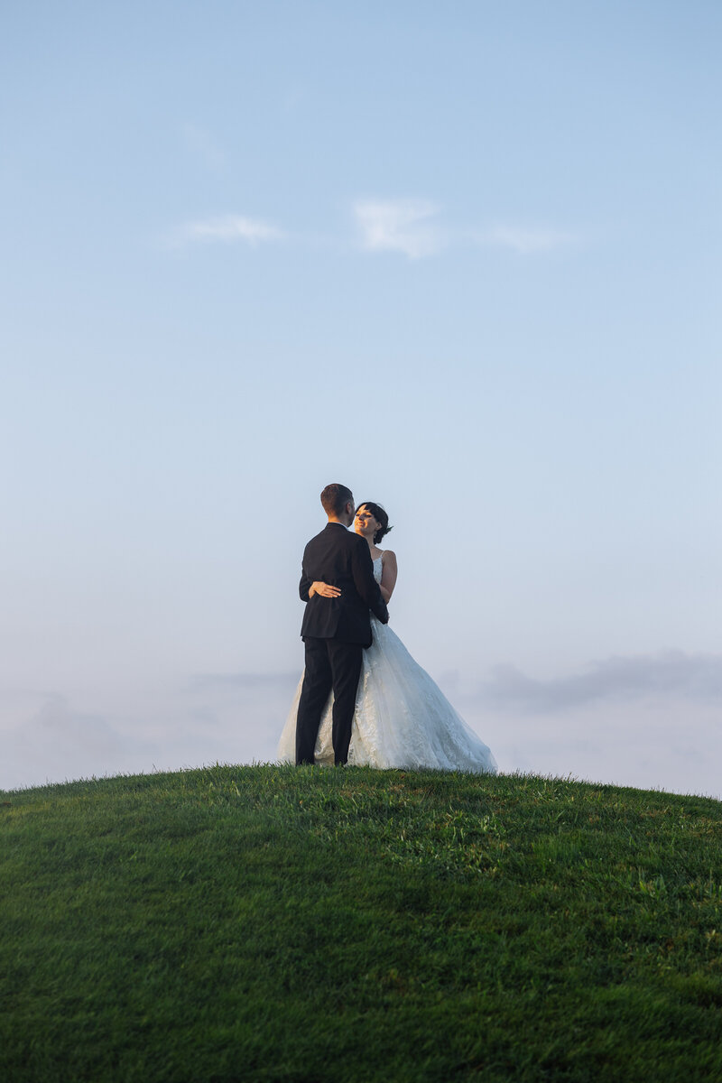 Bride and groom walk up memorial steps at their DC wedding