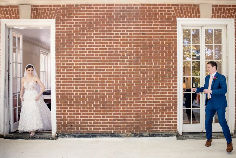 a bride and groom at their first look on their wedding day.  
