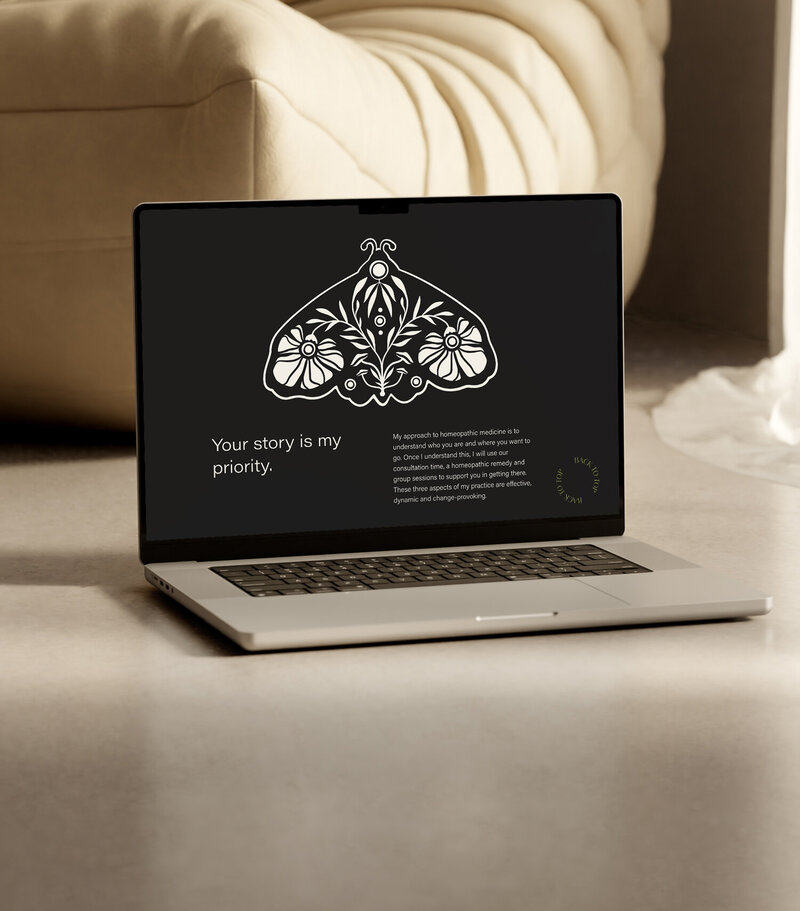 Custom branding and website design for a women-owned wellness business by Moonstone Creative, featuring a minimalist homepage mockup on a laptop.