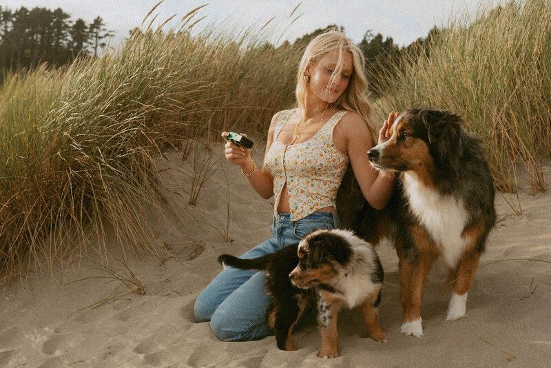 teenage girl walking on beach at oregon coast