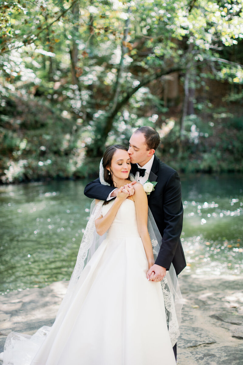 Bride and Groom at The Club in Birmingham AL Wedding by Kindred Event Co | Irrelephant MAE Bridal | Maddie Moore Photo