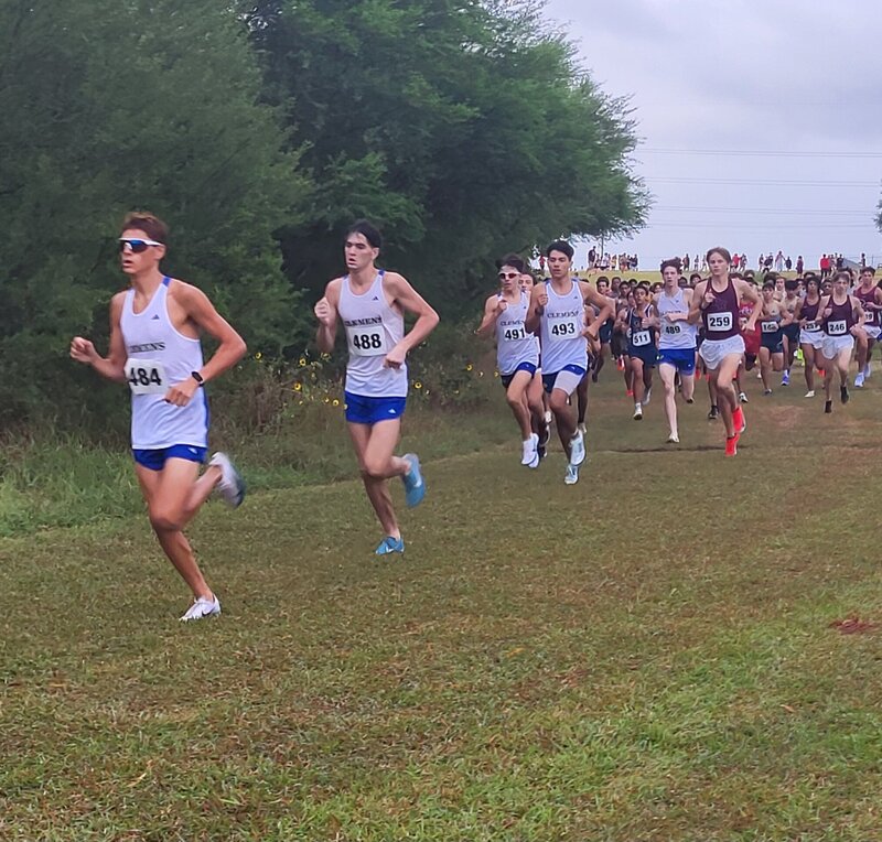 Personal trainers standing on road