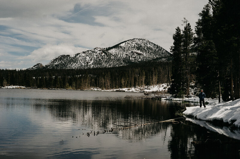 Landscape image of the rocky mountains and Sprague Lake in Rocky Mountain Nation Park during an intimate elopement ceremony.