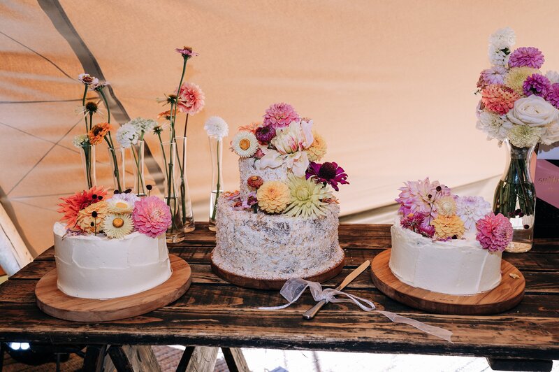 lamington wedding cakes with dahlias decorating them at a christchurch wedding