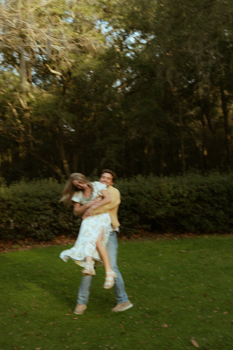 florida couple dancing in a field