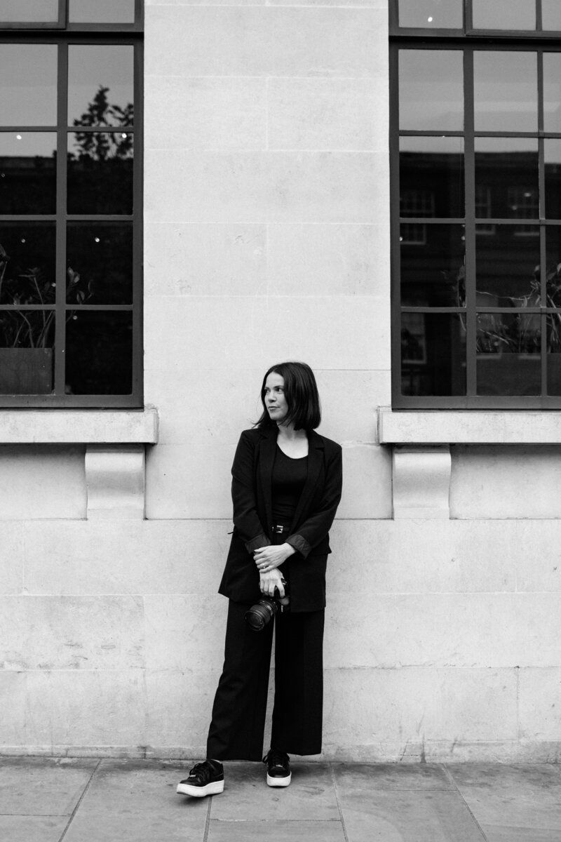 Photo of Victoria Baker in black and white in Leeds city centre - Modern wedding photographer based in Leeds UK