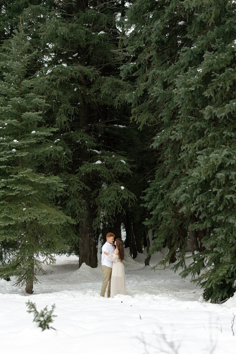 Snowy engagement photos at Jordan Pine Campground
