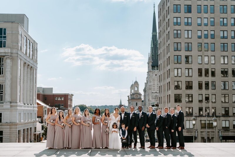 Blush Bridal Party holding Prose Florals bouquets captured by Him and Her Photo