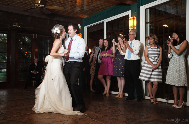 Wedding photo first dance inside Sun room at Greenbriar Inn