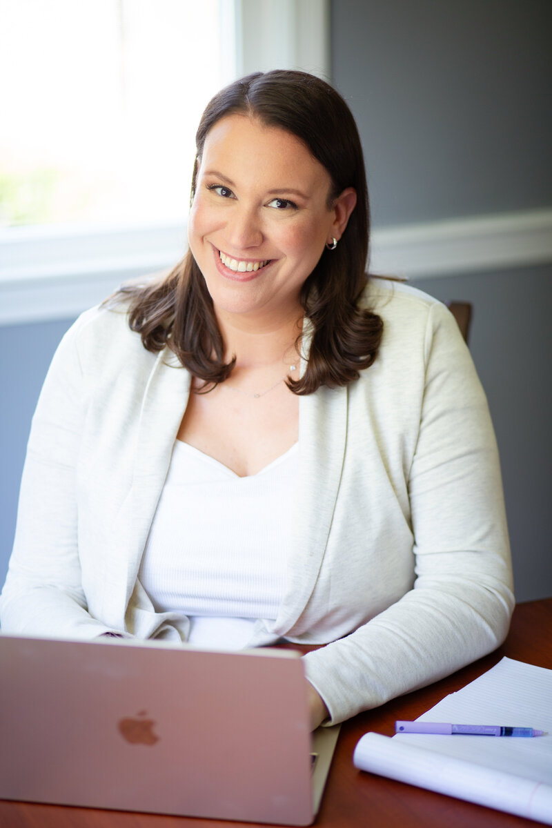 Therapist Sarah Choffnes holding coffee