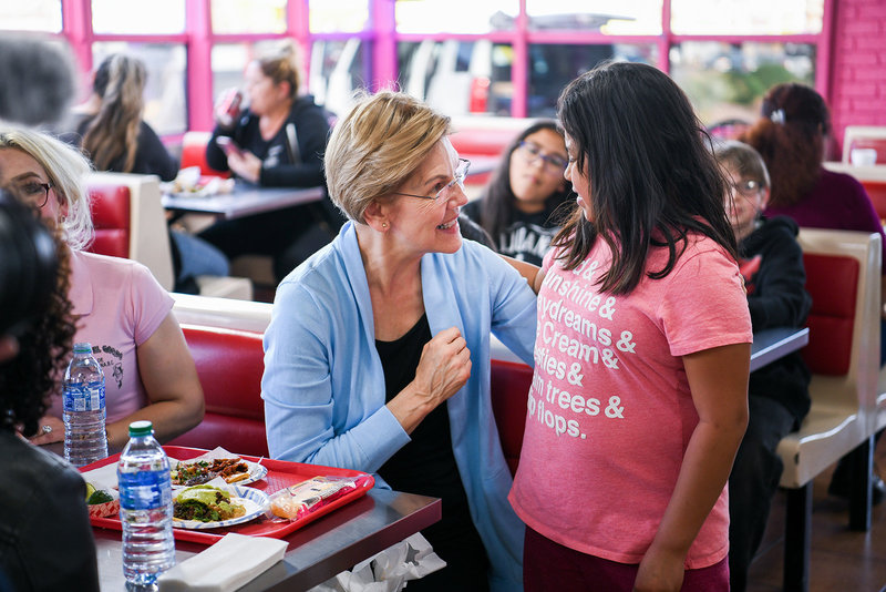 Elizabeth Warren 2020 democratic presidential primary speaking with young girl