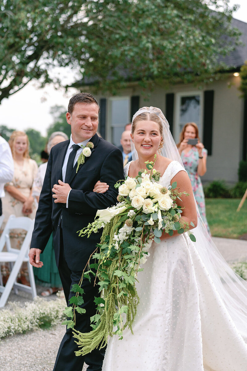 A father walking his daughter down the aisle in Nashville