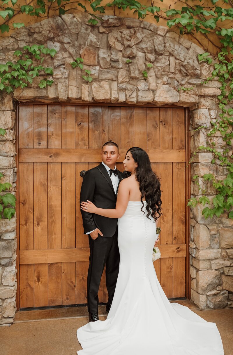 Newlyweds in a Doorway | Photography by Jocelyn