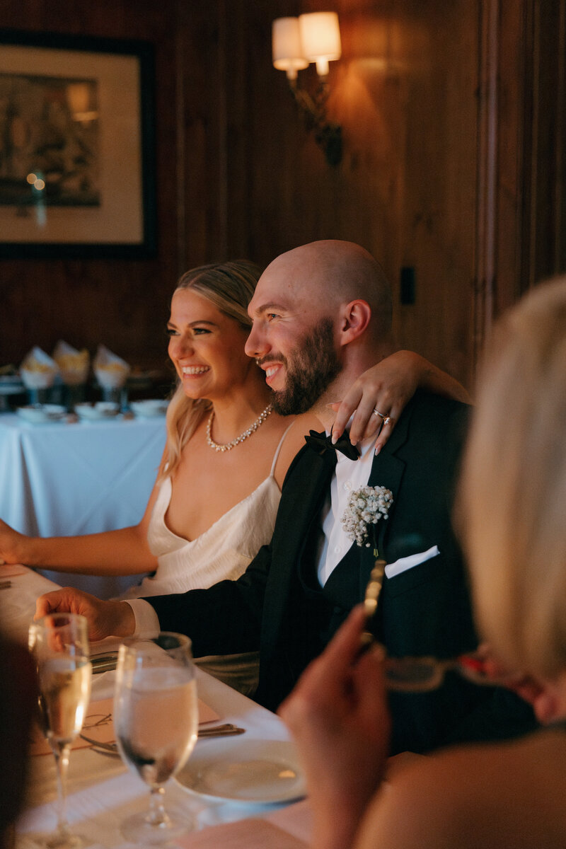 Documentary style wedding photographer captures an intimate candlelit dinner reception at the  Olde Pink House in Savannah GA's Historic District