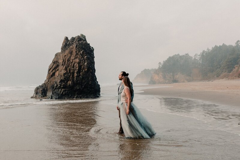 Couple standing in the water during an Oregon Coast Elopement