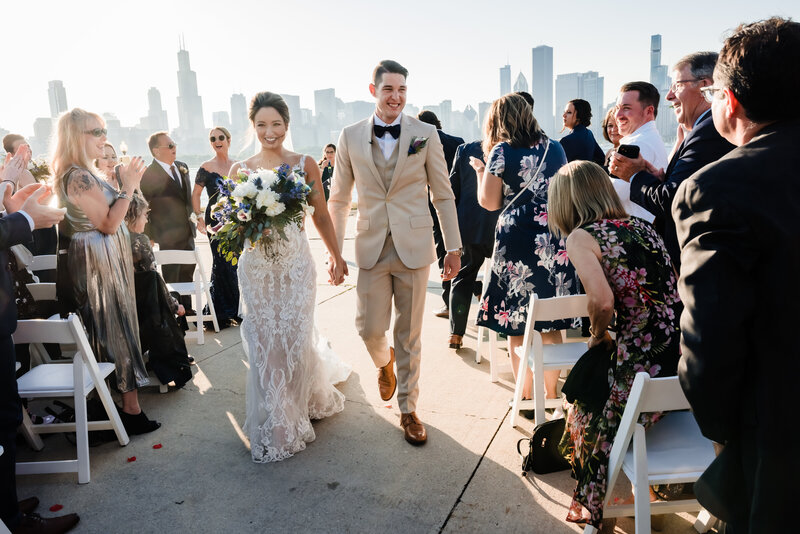 Bride and groom get married outside at the Adler Planetarium in Chicago, IL