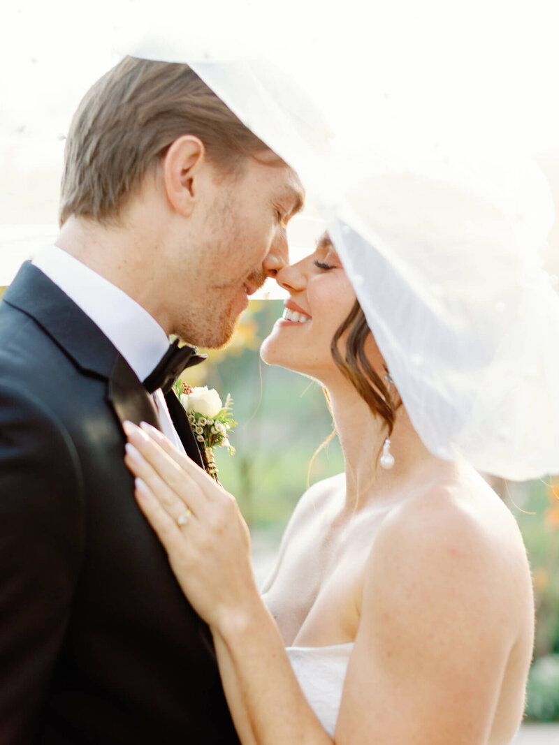 bridal veil shot of couple at monserate winery