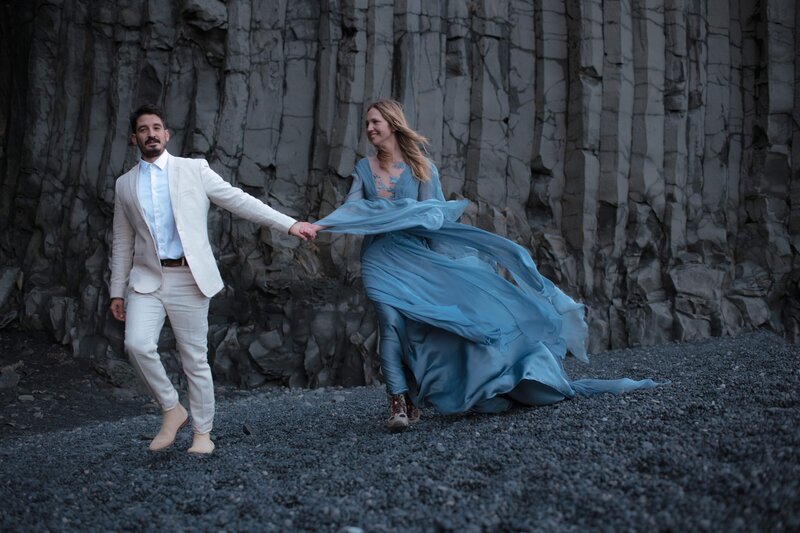 Iceland elopement photo at basalt cliffs edited with Golden Bloom preset – soft contrast, golden undertones, and cinematic depth for adventurous destination weddings.