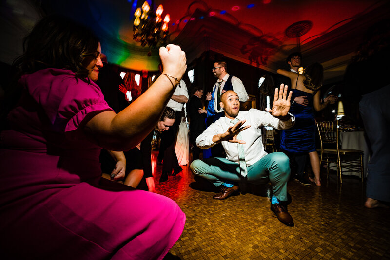 Wedding guests dancing during a reception at the Toledo Club