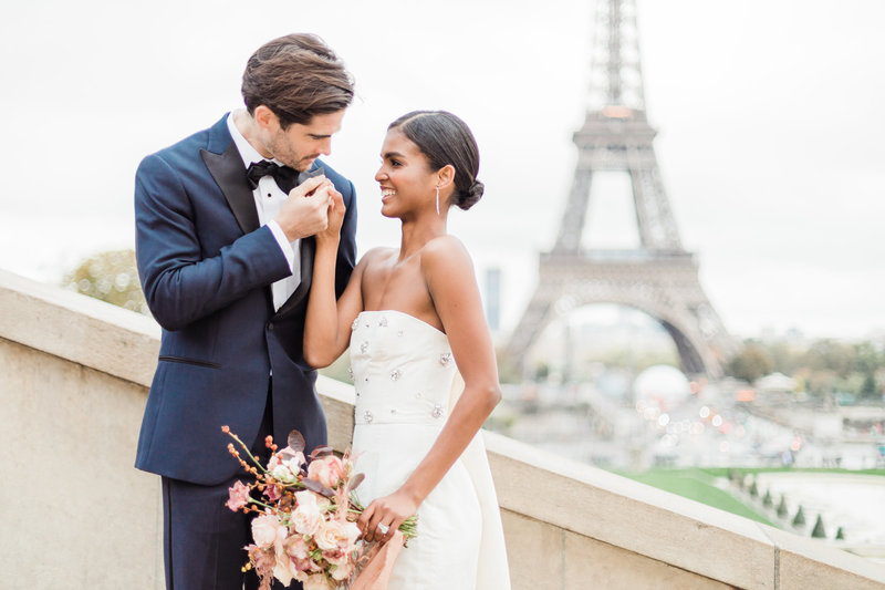 couple at Eiffel tower elopement in paris france by destination wedding photographer costola photography