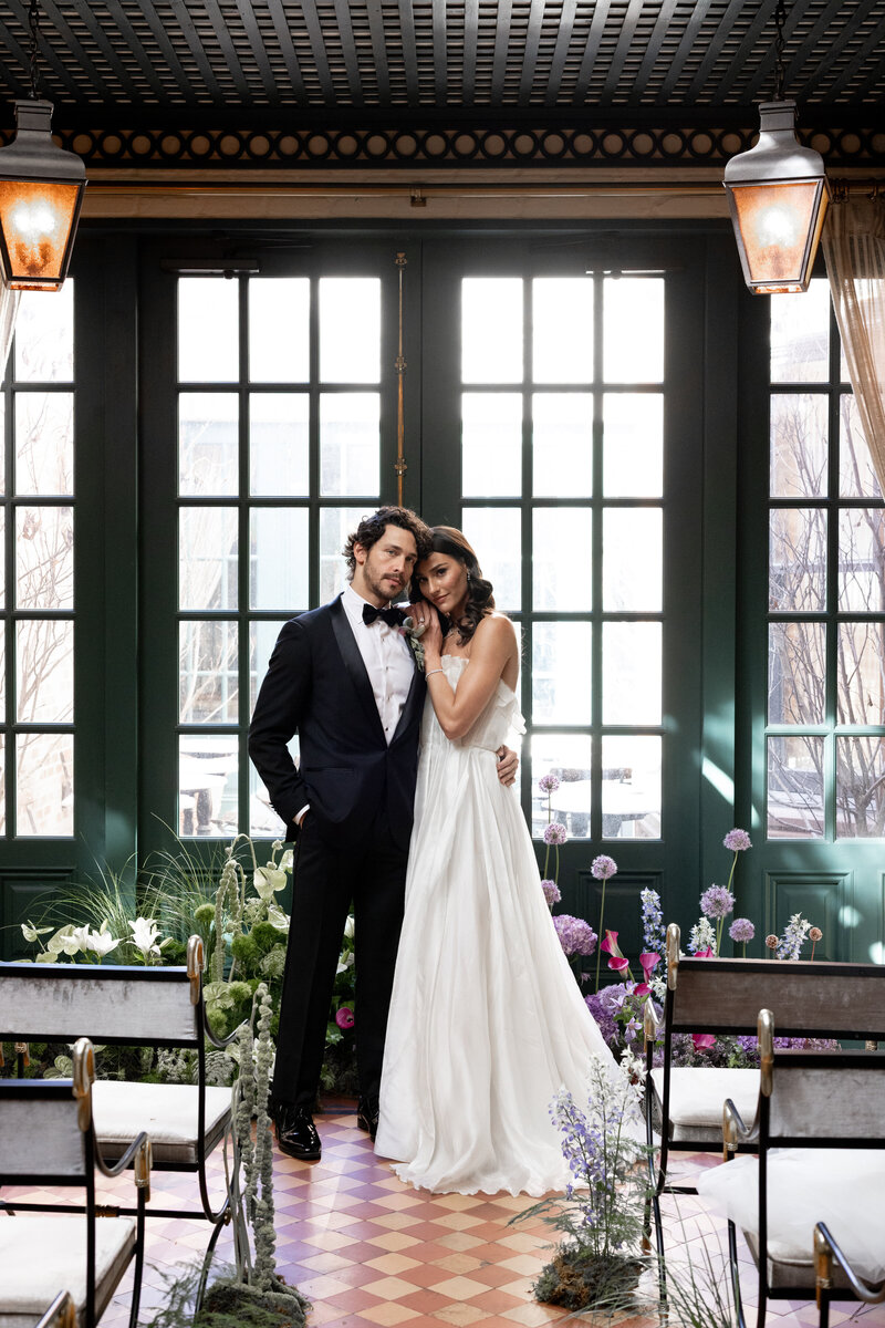 Hotel Chelsea wedding couple hugging in the ceremony space