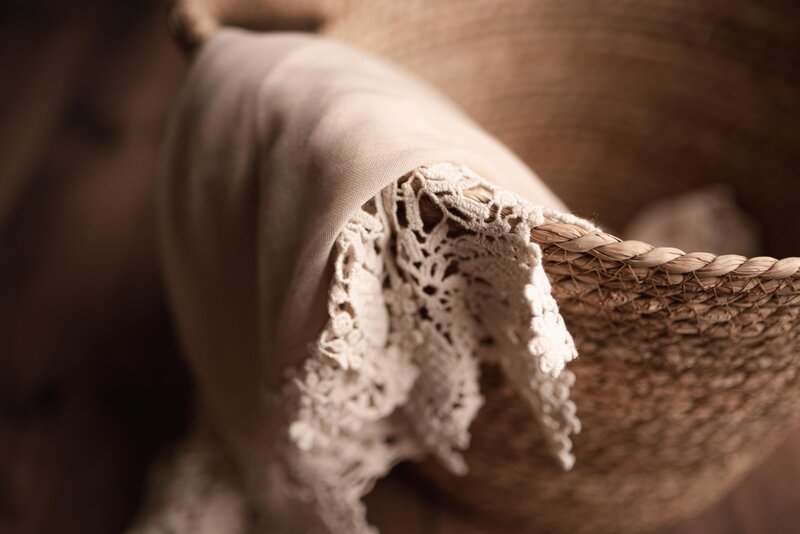 Close Up Of Boho Basket And Lace