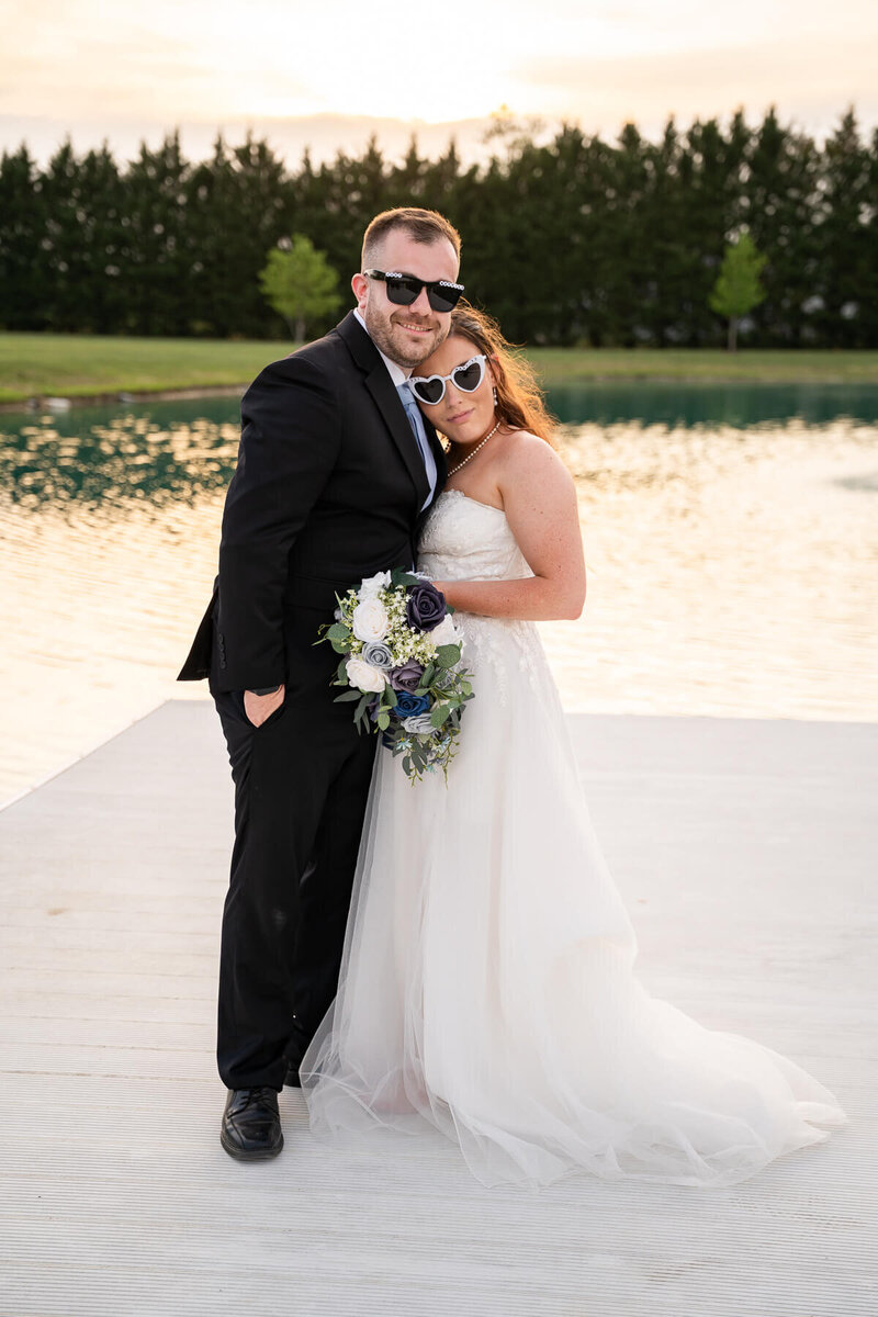 Groom dipping bride in the middle of the aisle post ceremony