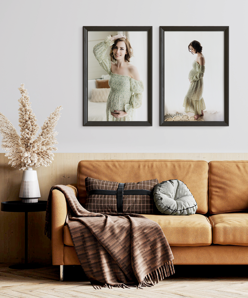 Framed prints of pregnant mom in the Fort Collins photo studio hanging on her living room wall