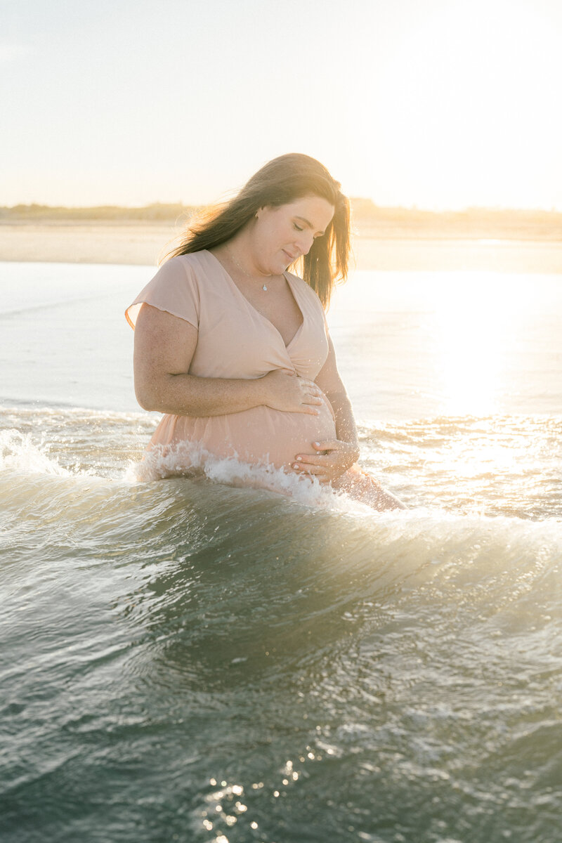 Maternity portrait session in the ocean in Avalon, New Jersey