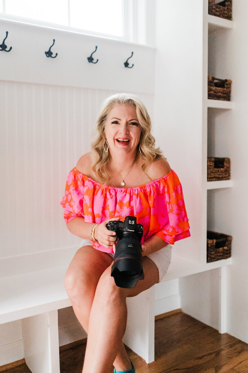 Senior Photographer Kellie Llewellyn with her camera