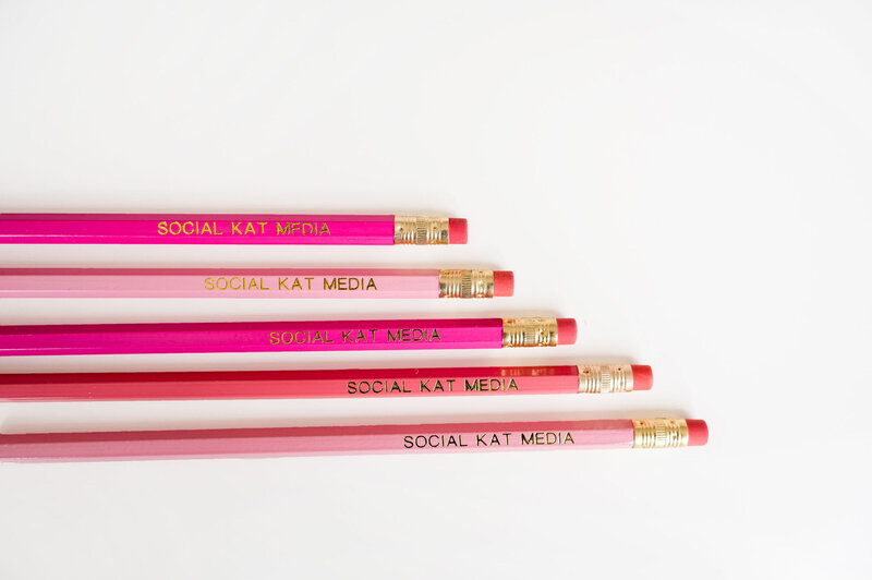 Pencils of different pink tones lined up next to each other